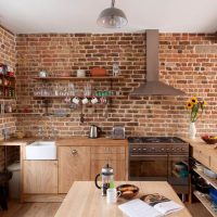 Wooden furniture in the loft style kitchen
