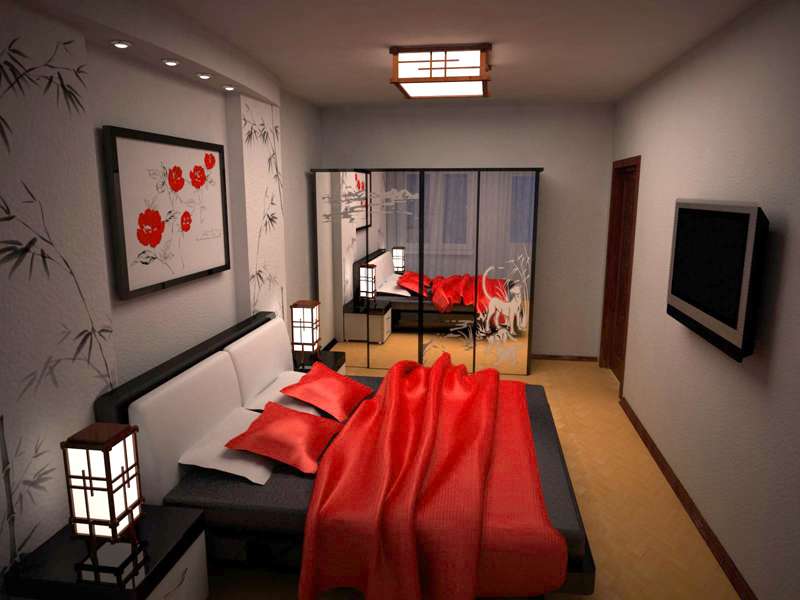 Couvre-lit rouge dans une chambre aux murs gris