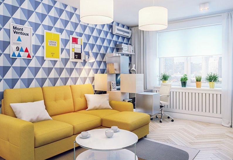 Wallpaper with a geometric pattern in blue tones on the wall in the living room