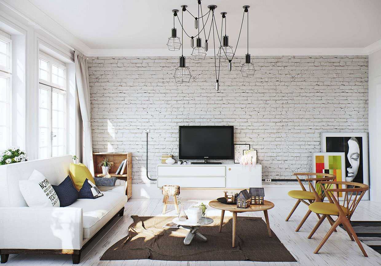 Salon spacieux avec murs de briques blanches