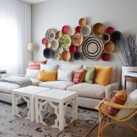 Decorative plates over the sofa in the living room