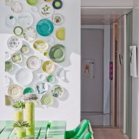 Colored plates on a white wall