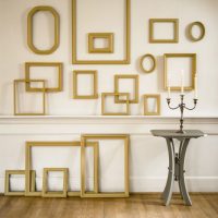 Wall decoration with golden frames