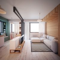 design cucina-soggiorno con divano bianco