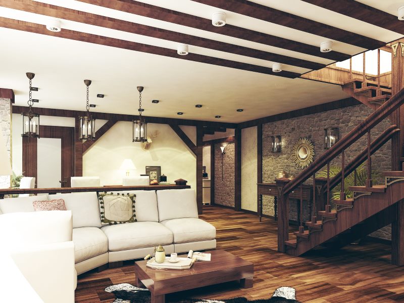 Spacieux salon de style chalet avec escalier dans un appartement en duplex
