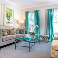 Turquoise curtains in the design of the living room
