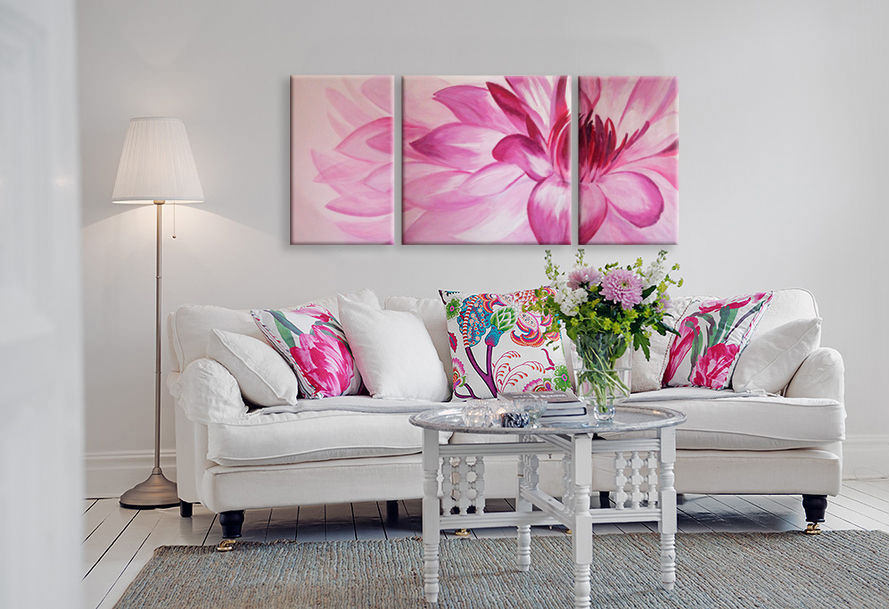 Pink flower on a modular picture in a white living room