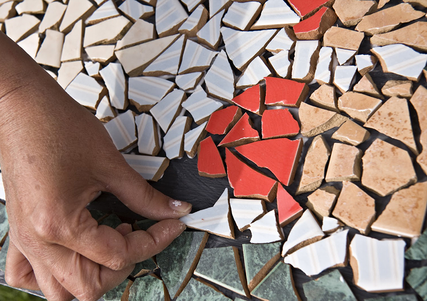 Do-it-yourself mosaic of broken ceramic tiles