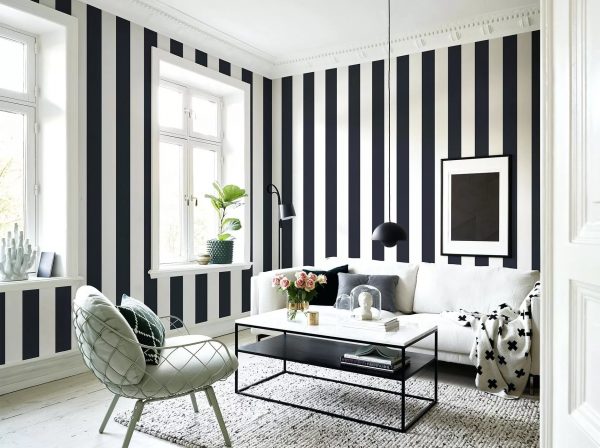 Using wallpaper with vertical stripes, you can visually stretch the room. Horizontal stripes will make the room wider.